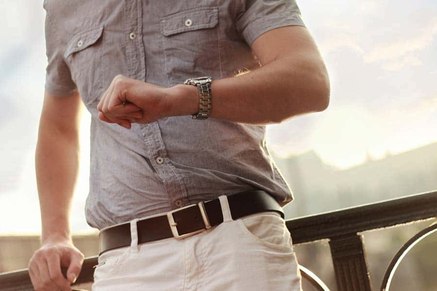 A man looking at his watch during an Austin Commercial Construction Company