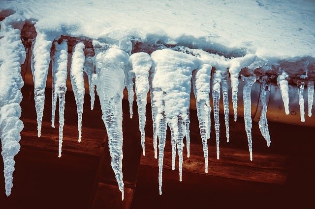 Icicles hanging off a rooftop