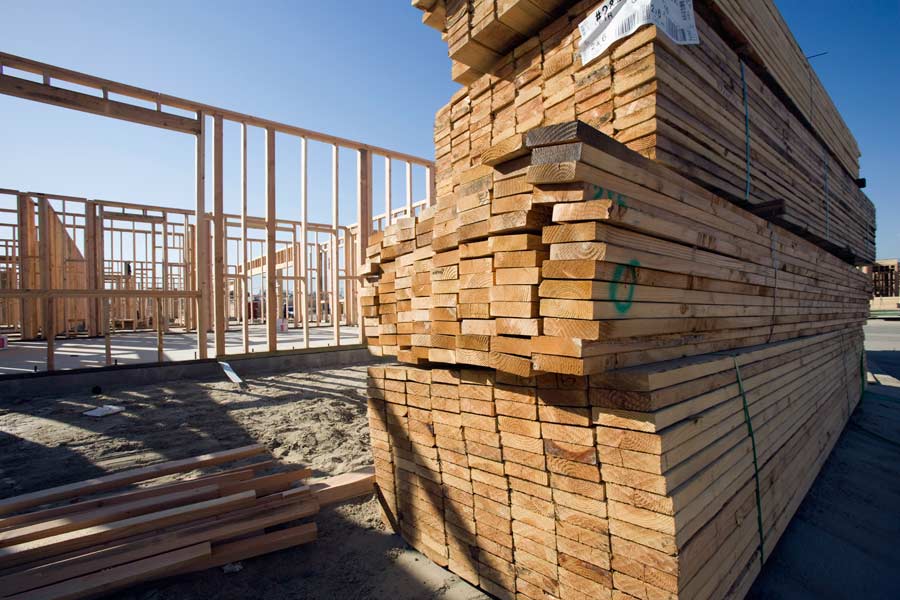 Reclaimed wooden planks on a construction site