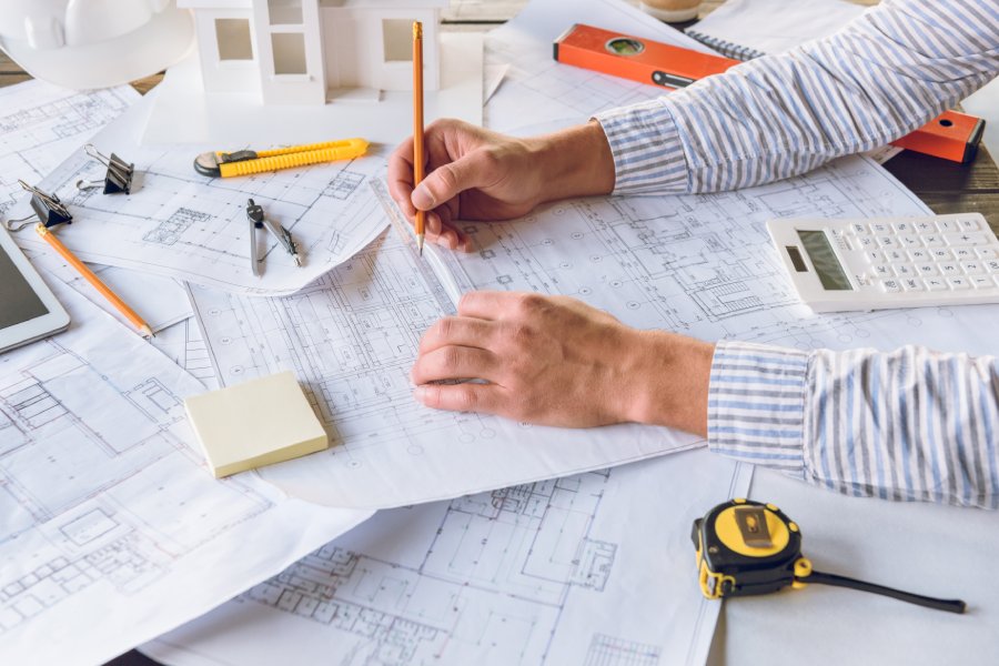 Experienced engineer collaborating with Austin contractors in the engaging design build process