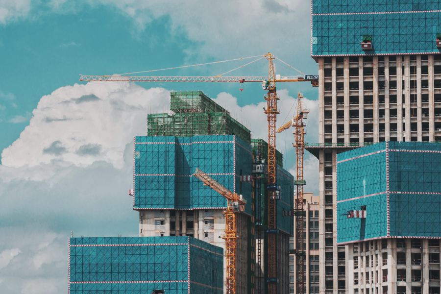 Sky Scraper being Built with clouds in the distance