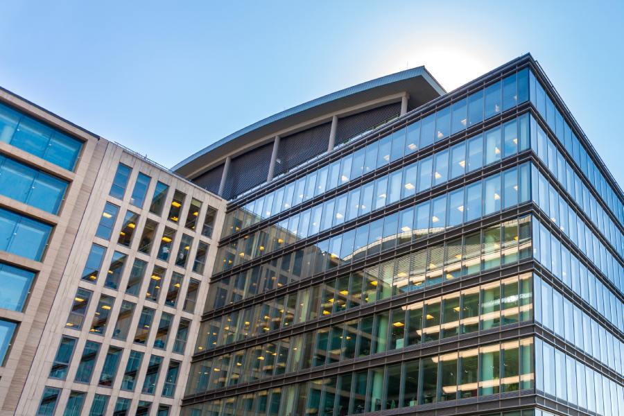 a commercial building with glass windows