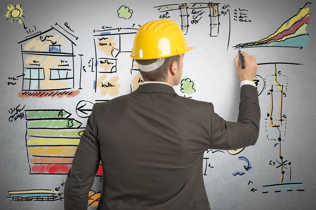 An engineer planning an Austin construction project on a whiteboard.